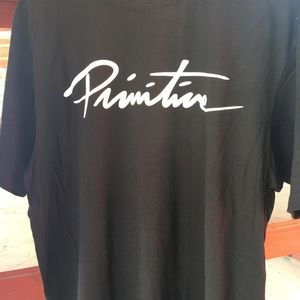 Is a black print T shirt
